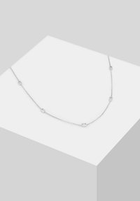 Sterling silver chain necklace with rectangular accents, featuring a minimalist design and a smooth, polished surface.