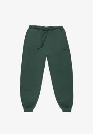 Zielone spodnie dresowe wykonane z miękkiego materiału, z elastycznym pasem i sznurkiem oraz bocznymi kieszeniami. Minimalne oznaczenie marki na nogawce.