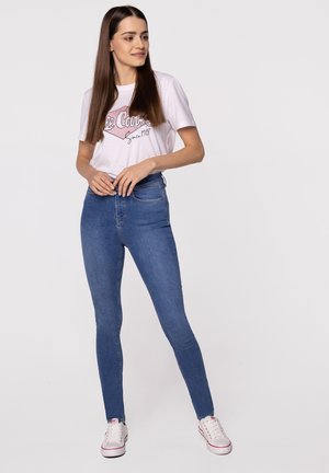 - Jeansy Skinny Fit