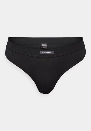 Mustad mustriga mustreid, pehmest kangast, lames tekstuuriga ja minimalismi disainiga. Sisaldab logo vööl.