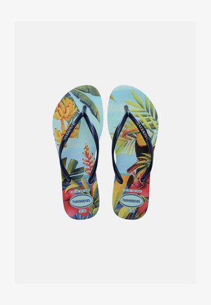 Egy pár Havaianas papucs fekete pántokkal és színes, trópusi levél- és virágmintákkal a talpán, méret 37-38 EU.