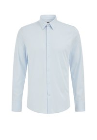 Világoskék, hosszú ujjas dresszinga, sima pamutból készült, hegyes gallérral és teljes gombolással. Nincsenek látható minták vagy díszítések.