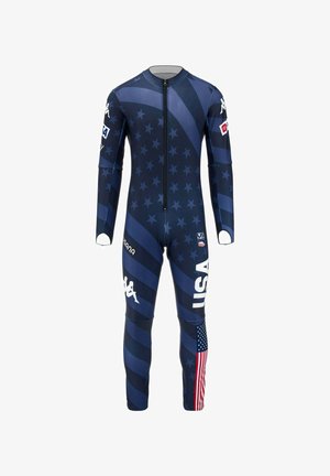 Tuta intera blu navy con motivo a stelle e strisce, caratterizzata da una zip frontale, testo "USA" bianco e un accento della bandiera americana.