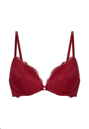 Rode kanten beha met gevoerde cups, verstelbare bandjes en een klein strikje in het midden. Bloemenpatroon benadrukt het ontwerp.