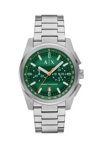 Ura iz nerjavečega jekla z zeleno številčnico, belimi oznakami ur, prikazom datuma in oranžno sekundo; vsebuje oblikovanje zapestnice s povezavami.