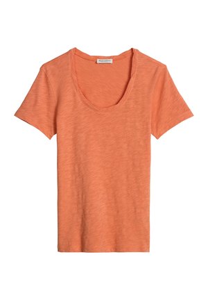 T-shirt femme à manches courtes orange clair, col rond, texture unie et étiquette à l'intérieur du col.