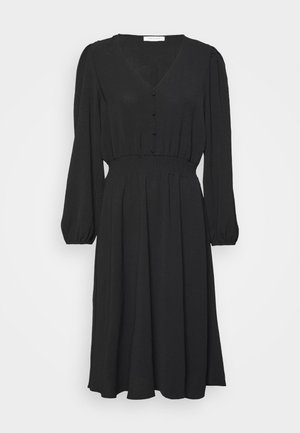 Vestido midi preto com mangas longas e volumosas, decote em V, detalhes em botões na frente e uma cintura franzida para um ajuste descontraído. Tecido macio.