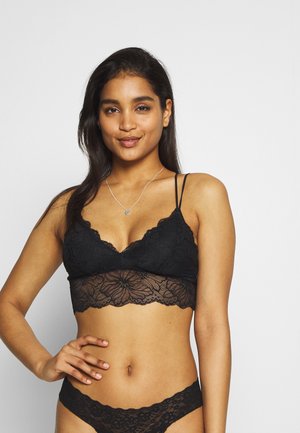 FLORAL - Alustoppi - black