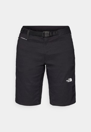 Melnas pārgājienu šorti, kas izgatavoti no viegla materiāla, ar jostu, šuvju detaļām un logotipu uz labā kāja.