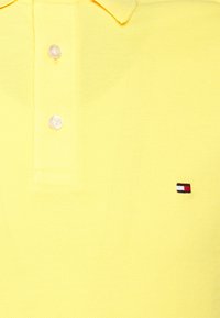 Tommy Hilfiger SLIM - Polo - warm yellow