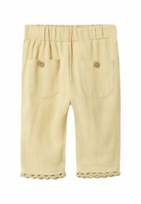 Pantaloni gialli in lino con una vita elastica, due tasche posteriori e un bordo in pizzo. Tessuto textured con una finitura morbida.