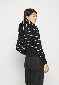 Calvin Klein Jeans LOGO ALL OVER PRINT HOODIE - Camisola - institutional black