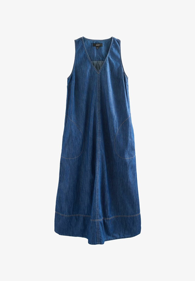 Denimklänning med V-hals, ärmlös design och stora sidfickor. Har kontrasterande sömmar, lös passform och medellång silhuett.