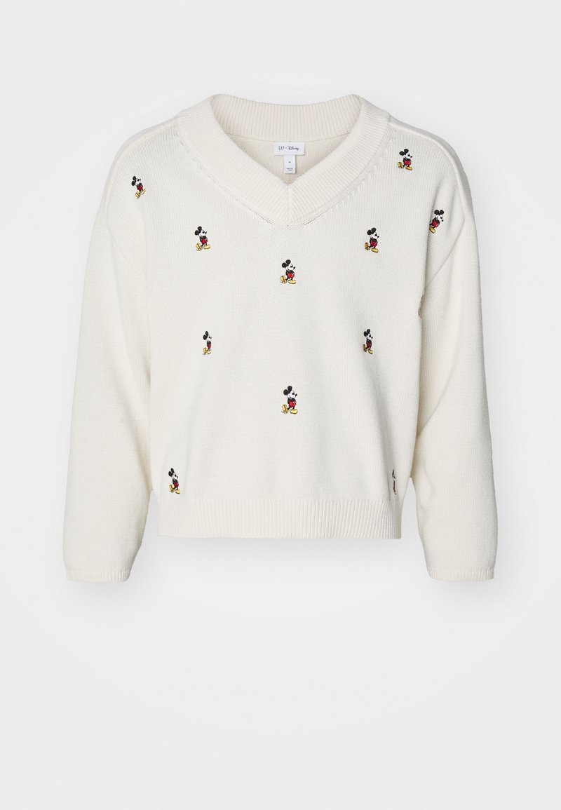 Pull blanc à col en V avec plusieurs petites figures de Mickey Mouse brodées, réparties uniformément sur le devant et les manches.