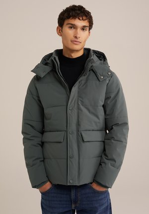 Puffer jacket in muted green, featuring a hood, snap buttons, and two front pockets. Material appears smooth with subtle texture.
