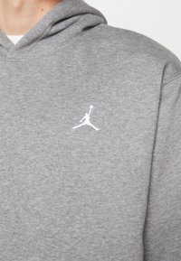 Jordan M J ESS FLC PO - Felpa con cappuccio - grey