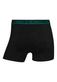 Zwarte boxershorts met een groene elastische tailleband waarop "JBS" in het zwart is gedrukt. Glad materiaal, aansluitend ontwerp en middellange lengte tot boven de dijen.