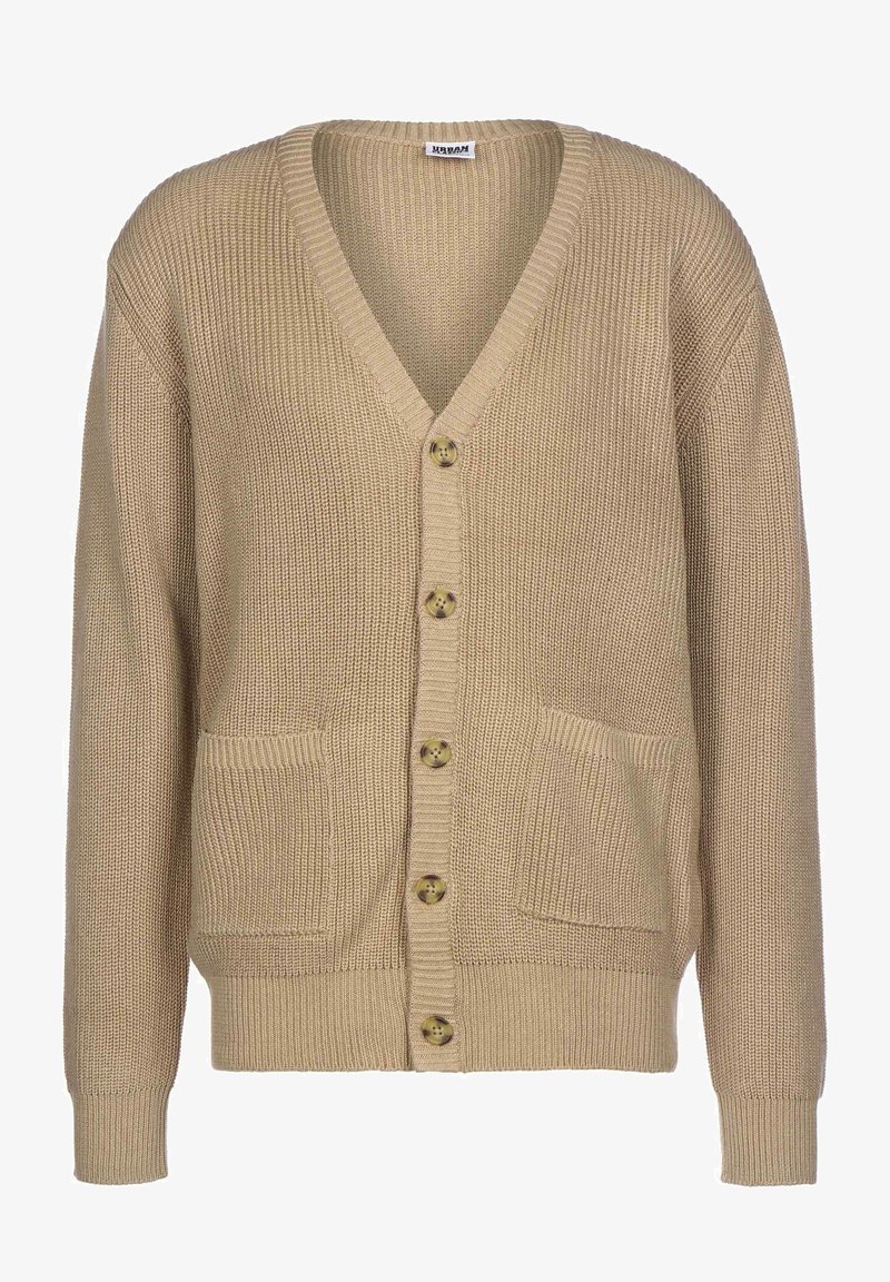 Cardigan beige en maille avec col en V, cinq boutons sur le devant, deux poches devant, et poignets et ourlet en côtes.