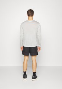 icebreaker MERINO ZONEKNIT - Ulkoshortsit - BLACK