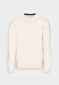 Lys beige crewneck genser laget av mykt materiale. Har ribbede mansjetter og nederkant, med en subtil tekstur og minimale design detaljer.