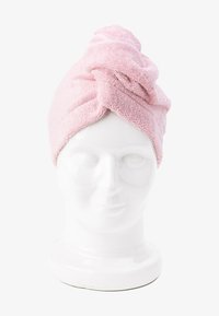 Pink microfiber hair wrap with a twisted top design, soft texture, and secure fit. Presented on a blank mannequin head for display.
