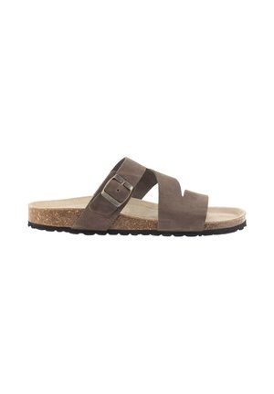 Sandalia deslizante de ante marrón con dos correas entrelazadas y una hebilla metálica. Plantilla de corcho y suela exterior de goma negra texturizada. Diseño elegante y simple.