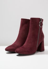 Anna Field Tronchetti - dark red