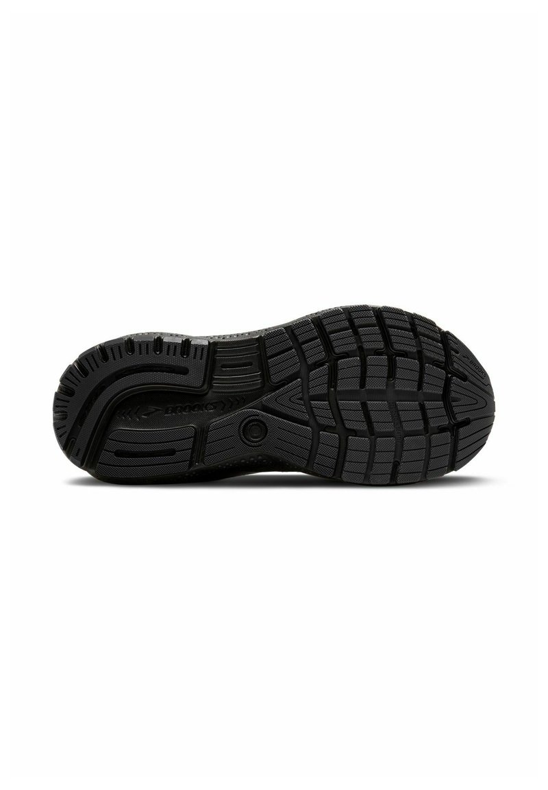 Schwarze Laufschuhsohle aus strukturiertem Gummi für Grip, mit einem Muster aus Rillen und Profilen für Traktion und Stabilität.