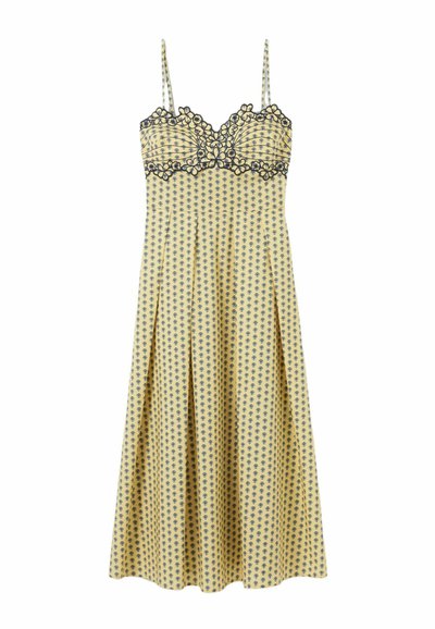 Abito giallo con stampa floreale blu navy, dettagli in pizzo sul busto, spalline sottili e regolabili, e una silhouette A-line fluida.