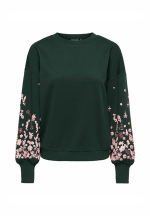 Felpa verde scuro a maniche lunghe con ricamo floreale rosa che copre densamente le maniche inferiori e i polsi.