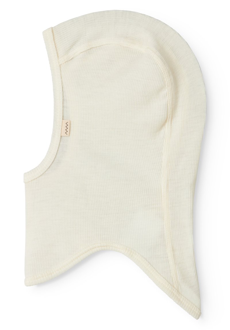 Light beige cotton balaclava with ribbed texture, rounded shape, and soft edges. Features a small brand tag on the side.