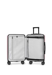 Hard-shell pink suitcase with a black trim, dual compartments, and silver lining. Features four wheels and a retractable handle.