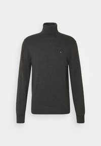 Pullover dolce grigio scuro con collo a dolcevita, design aderente, maniche lunghe e un piccolo logo sul petto. Realizzato in morbido tessuto a maglia liscia.