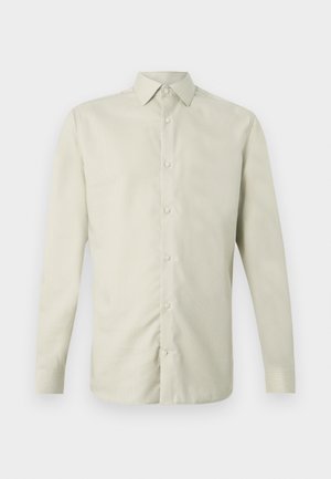 Camicia verde chiaro a maniche lunghe con bottoni, colletto classico, tessuto strutturato e chiusura frontale con bottoni, caratterizzata da un taglio dritto.