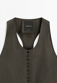 Dark olive green sleeveless vest with eight black buttons down the front and a "Massimo Dutti" label stitched inside the collar.