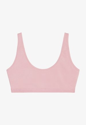 Bralette en coton de couleur rose clair, avec un décolleté large, des bretelles fines et une texture lisse. Sans armatures, avec un lettrage de la marque subtil au niveau de l'ourlet.