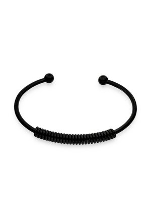 Bracciale in metallo nero con design centrale a spirale, estremità lisce e forma minimalista aperta.