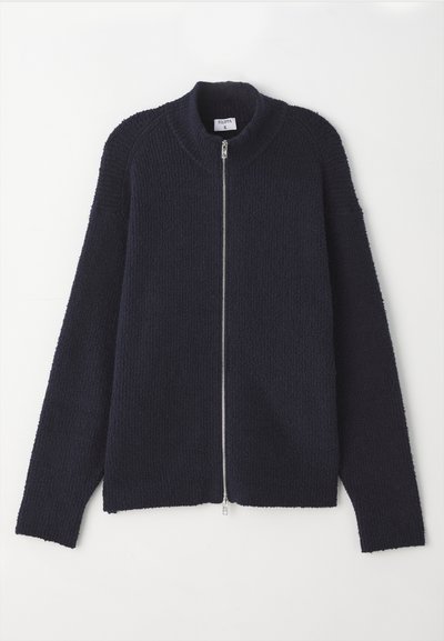 Μπλέ ζακέτα με φερμουάρ και υφή πλεκτού, ριμπ κολάρο και μανσέτες, χαλαρή εφαρμογή και ασημένιο φερμουάρ.