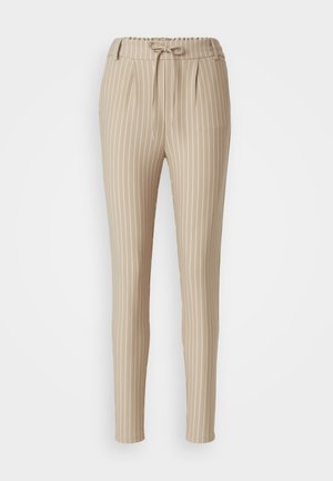 Beige striped trousers with a drawstring waistband, tapered leg design, pleated front, and smooth texture. Vertical white stripes are featured.