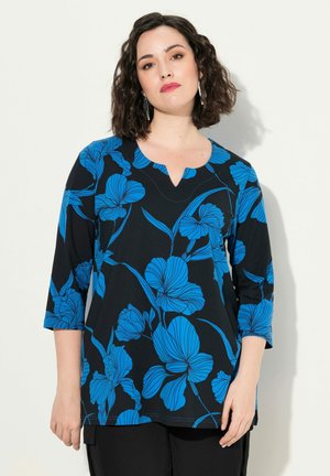 - Bluzka z długim rękawem