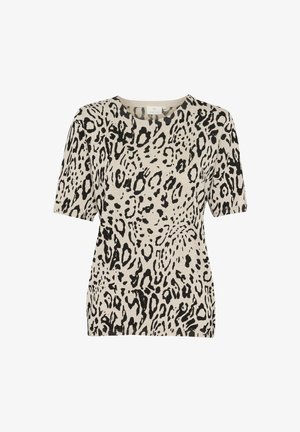 Haut beige à manches courtes avec un motif léopard noir, col rond et tissu texturé pour un look décontracté.