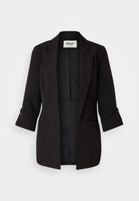 Veste noire pour femme avec manches retroussées aux trois quarts, revers crantés et deux poches fendues à l'avant, étiquette "ONLY tailoring".