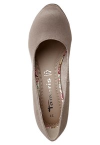 Ballerine beige pour femme avec un bout arrondi, une doublure intérieure florale et une étiquette de marque « Tamaris » à l'intérieur, pointure 37.