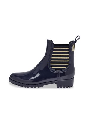 Bottes en caoutchouc bleu marine à hauteur de cheville avec une finition brillante, dotées d'un panneau élastique rayé et d'une semelle texturée pour une meilleure adhérence.