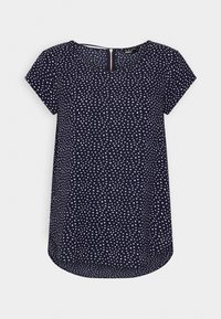 Blouse à manches courtes bleu marine avec un motif à taches blanches, encolure ronde et détail en trou de serrure au dos. Tissu doux avec une coupe décontractée.
