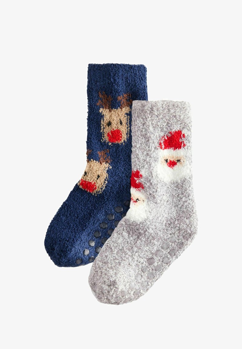 Két pár bolyhos zokni: az egyik sötétkék, rénszarvas mintával, a másik világosszürke, Mikulás motívummal. Mindkettő csúszásgátló talppal rendelkezik.