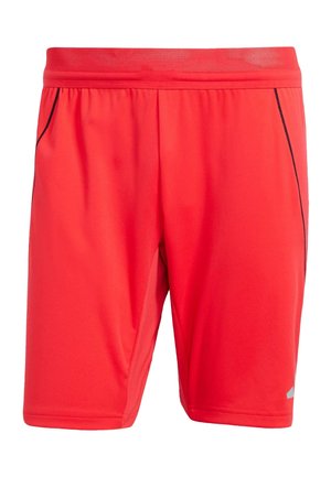 Red athletic shorts with a mesh waistband, black side accents, and a smooth texture. Designed for comfort and mobility during sports.