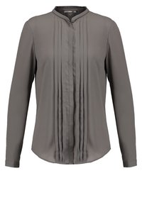 Grå langærmet bluse med plisseret front, høj halsudskæring og glat stof med en let afrundet kant. Ingen synlige knapper eller mønstre.