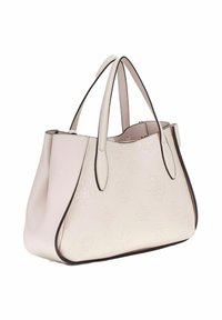 Borsa tote in pelle crema con motivo floreale a rilievo, bordi neri e due manici superiori. Presenta un interno spazioso e una forma strutturata.