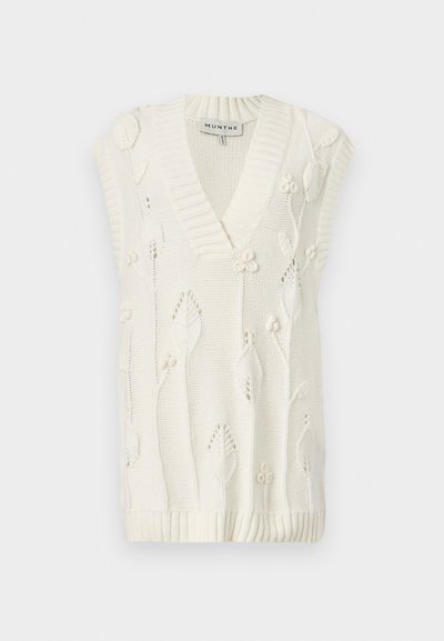 Pull sans manches en maille blanche avec col en V, bords côtelés et détails de broderie florale sur l'ensemble. Texture douce avec une coupe décontractée.